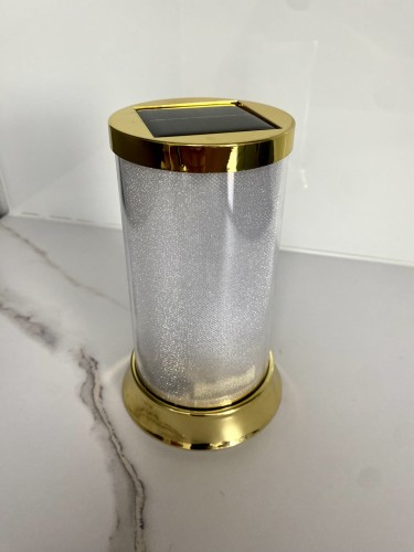 Znicz solarny złoty biały odcień ciepły znicz cmentarny