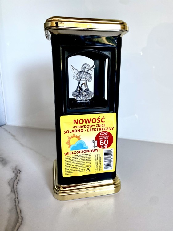 Elegancki czarno złoty znicz solarny elektryczny z aniołkiem na grób