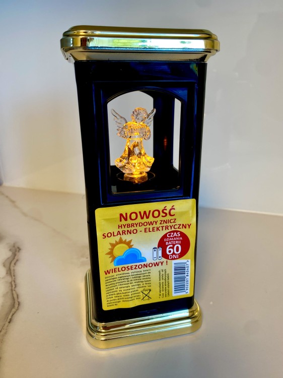 Elegancki czarno złoty znicz solarny elektryczny z aniołkiem na grób